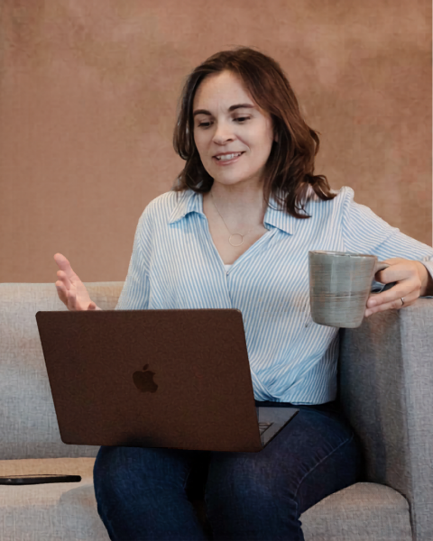Emily at work, thoughtfully reviewing client materials